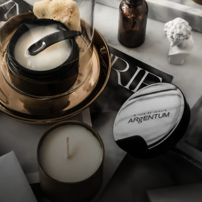 Oil to milk cleanser open on a copper tray with natural sea sponge